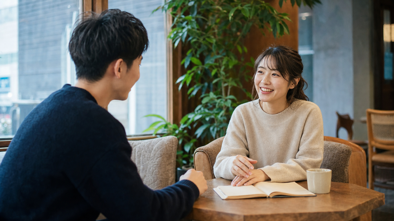リア充になる方法を続けるためにカフェで話す二人